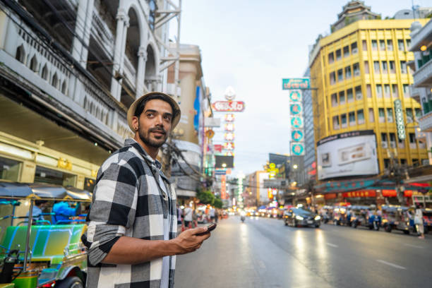 istock Young Iranian Man stroll through Chinatown in Bangkok Thailand 2162758063