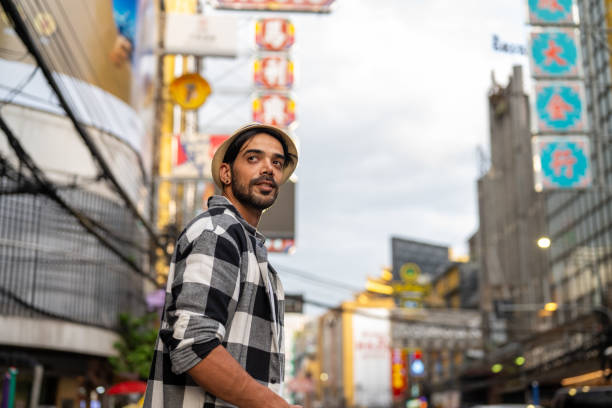 istock Young Iranian Man stroll through Chinatown in Bangkok Thailand 2162758081