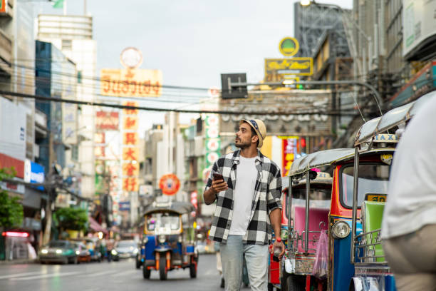 istock Young Iranian Man stroll through Chinatown in Bangkok Thailand 2162758093