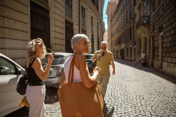 Three beautiful mature friends sightseeing in Rome