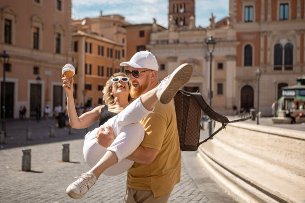 Two beautiful mature friends sightseeing in Rome