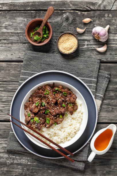 istock Bulgogi, Korean BBQ Beef with rice, top view 2162761041
