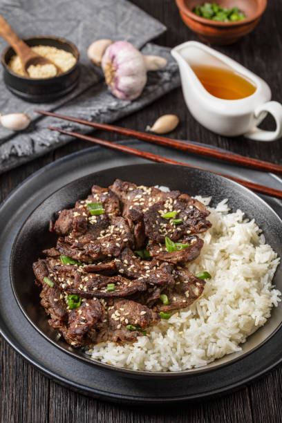 istock Bulgogi, Korean BBQ Beef with rice, top view 2162761060