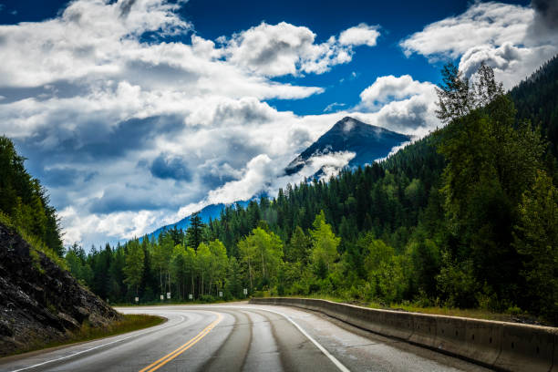 driving with a car on a mountain road in Alberta in Canada