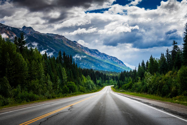 istock driving with a car on a mountain road in Alberta in Canada 2162762009