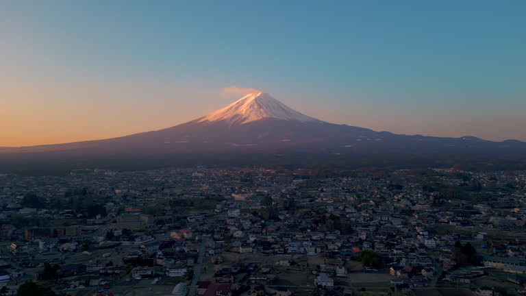 Aerial view cityscape and Mount Fuji in sunrise time