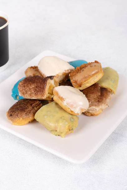 istock Assorted Eclairs in Vibrant Colors: A Delightful and Colorful Pastry Display 2162767390
