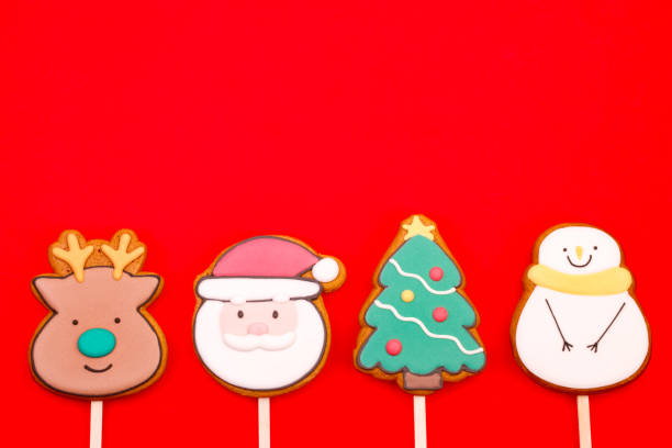 istock Christmas Themed Iced Cookies on Red Background 2162770711