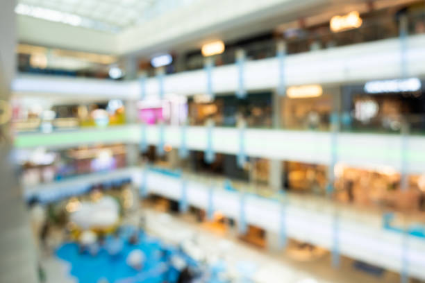 istock Blurred image of shopping mall and bokeh for background usage. 2162773624