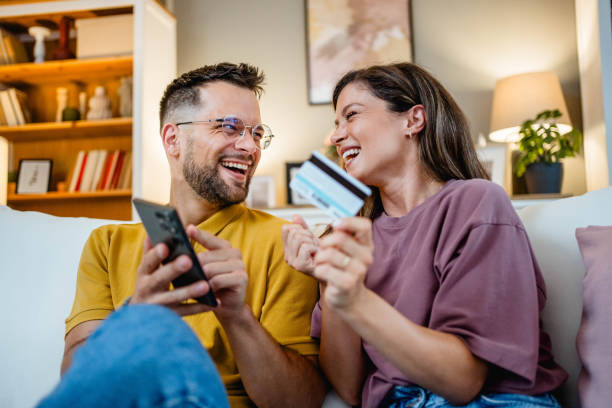 istock Young couple using smartphone for online shopping 2162774258