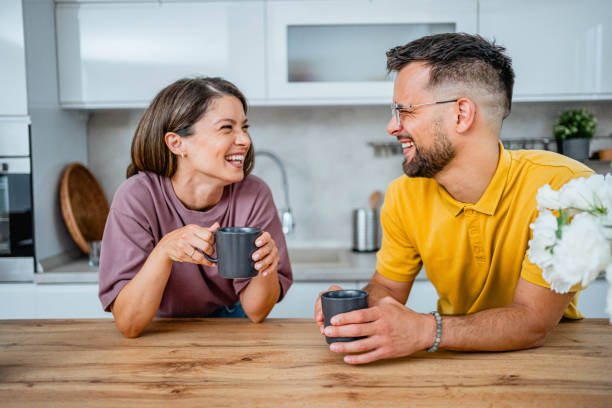 istock Young couple drinking coffee together 2162774802