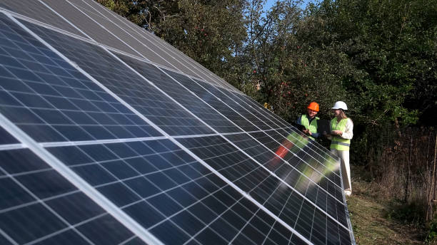 istock Architect and engineer when installing solar panels. Man and woman or team of engineers with technology at a meeting or construction planning 2162775612