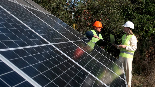 istock Architect and engineer when installing solar panels. Man and woman or team of engineers with technology at a meeting or construction planning 2162775613