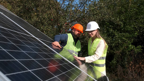 istock Architect and engineer when installing solar panels. Man and woman or team of engineers with technology at a meeting or construction planning 2162775646