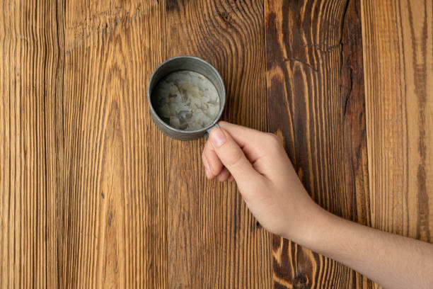 istock Hand Holds Cup, Empty Tin mug in Hands, Vintage Coffee Mug, Old Iron Teacup, Hot Beverage Mockup 2162780474