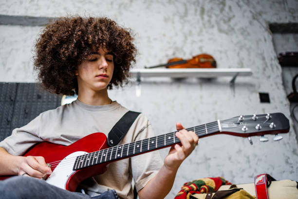 istock Boy play solo on electric guitar 2162783507
