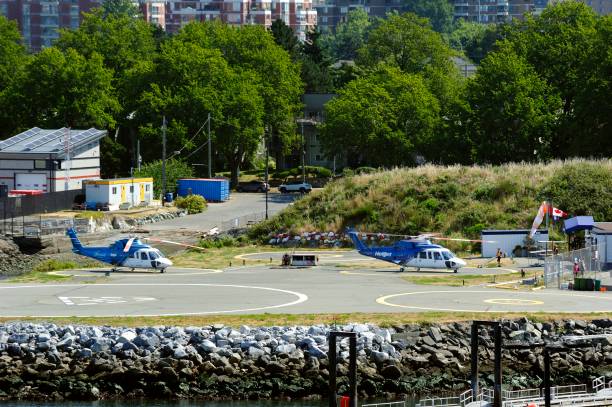 Victoria, Canada - 3rd July 2023:Helijet Helicopters on the landing pad in Victoria
