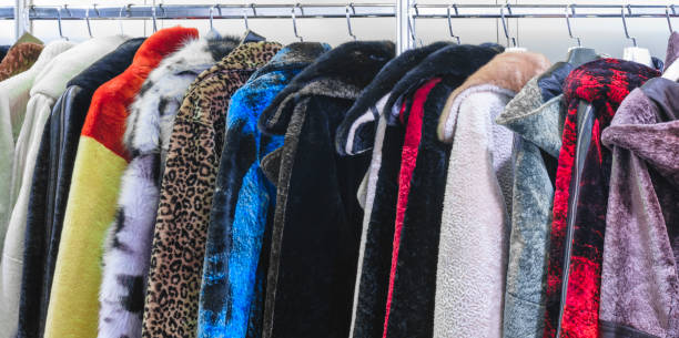 istock multicolor clothing in the store market 2162789902