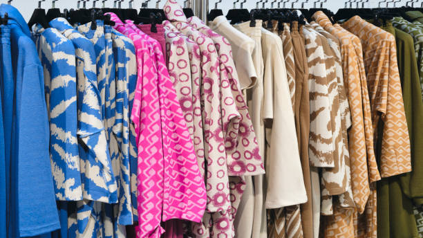 istock multicolor clothing in the store market 2162789993