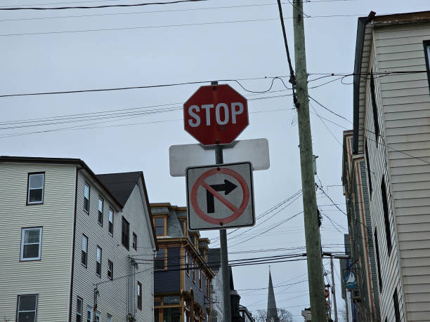 istock Stop sign and arrow sign 2162790171