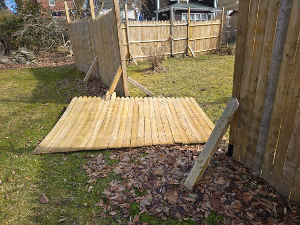 istock Section of fence blown over 2162790519