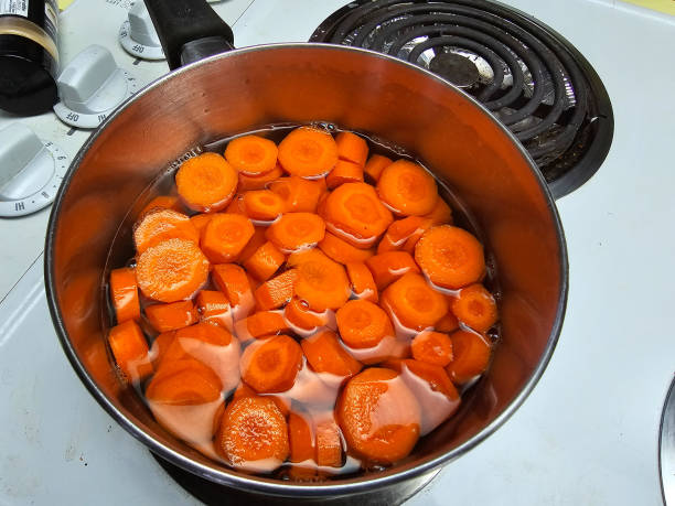 istock Carrots in pot 2162792615