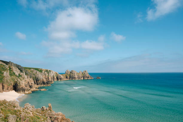 istock Cornish Paradise, view from cliffs along Pedn Vounder Beach at high tide on a perfect sunny June late afternoon. 2162793904