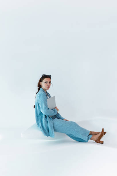 istock Woman with laptop in studio 2162797114