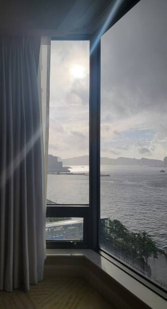 istock Room with a view - Morning over Victoria Harbour 2162808351