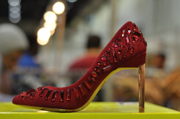 View of high-heeled elegant luxury sandals adorned with stones