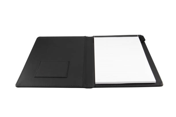 Black color leather fabric hardcover notebook isolated on white background