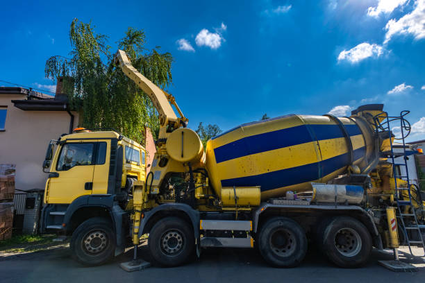 istock A concrete mixer feeds concrete into the screed when building a house 2162815047