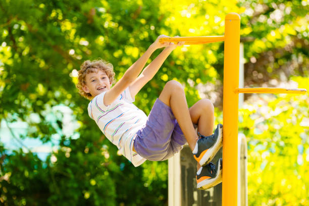 istock Child on playground. Active kid in school yard. 2162818105