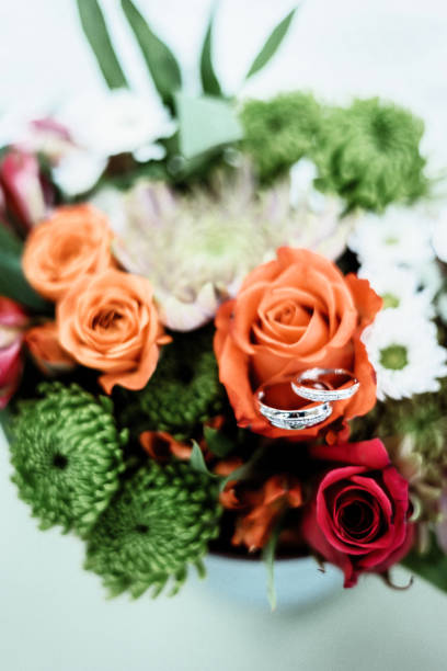 bridal bouquet and engagement ring
