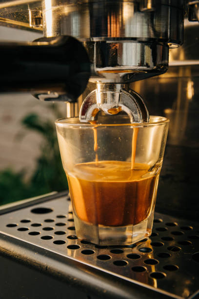 istock espresso machine pouring espresso shot into a glass 2162822178