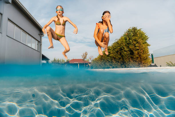 Summer fun jumping in the pool