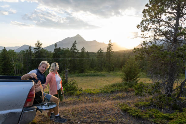 istock Senior hiking couple pause by vehicle 2162823772