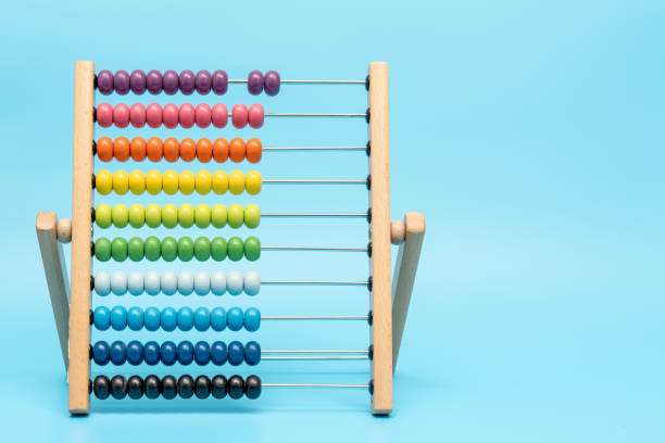 istock A wooden abacus with colorful beads on it 2162824135