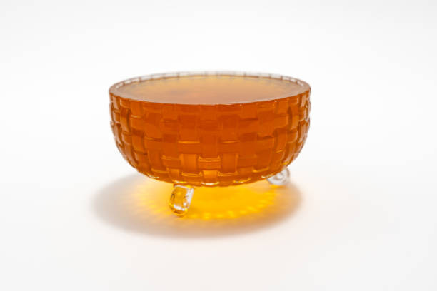 istock Small glass bowl with honey. 2162824178