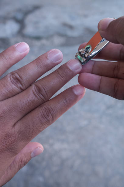 istock hands are cutting nails to keep them clean and free from germs 2162836509