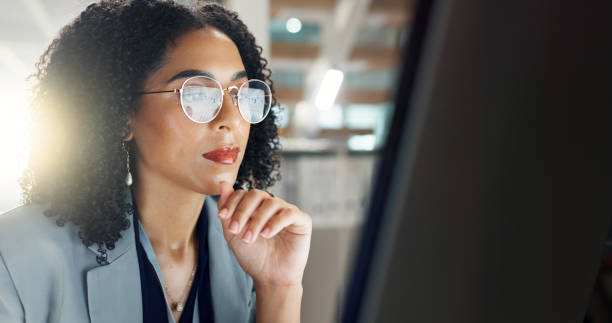istock Thinking, office and business woman on computer for online project, proposal and research. Corporate, professional and person on pc monitor for internet, website search and reading email at desk 2162838454