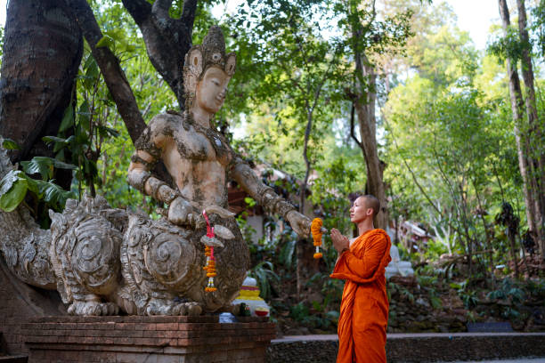 istock Thai Buddhism monk making offering at the temple 2162841587
