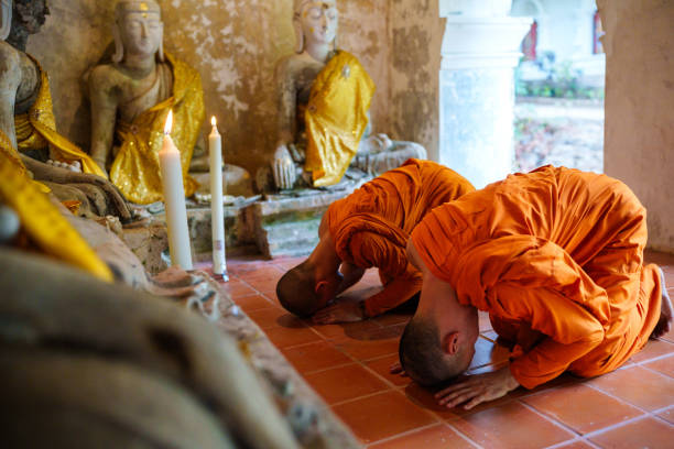 Buddhism Thai monks praying inside the temple