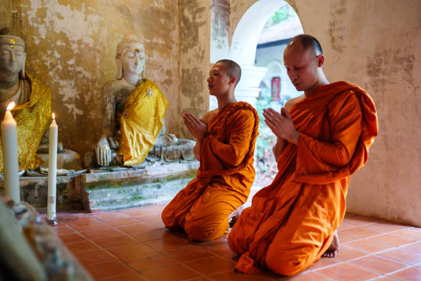 istock Buddhism Thai monks praying inside the temple 2162841593