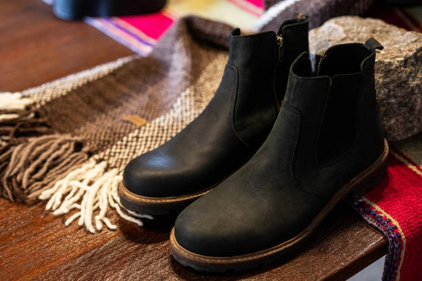 istock Leather boots for sale on display 2162844258