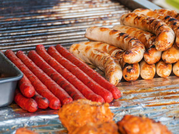 Grilled Sausages and Hot Dogs on BBQ