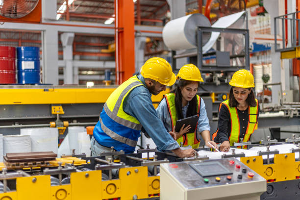 istock Two inspectors checking in a factory 2162847526