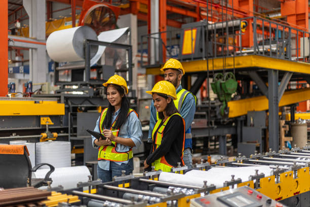 istock Two inspectors checking in a factory 2162847529