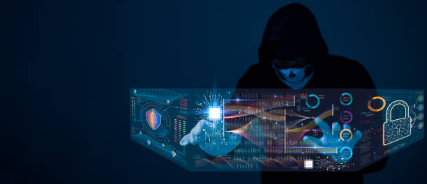 istock A hacker in a hoodie is hacking into a computer screen. Concept of danger and suspense, as the man is attempting to gain unauthorized access to the system 2162848223