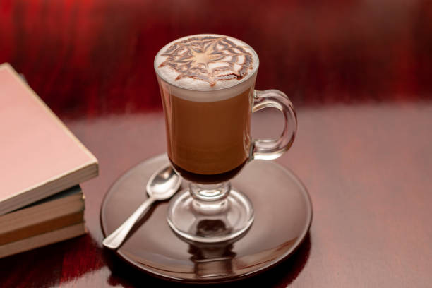 Cup of coffee on a wooden table.